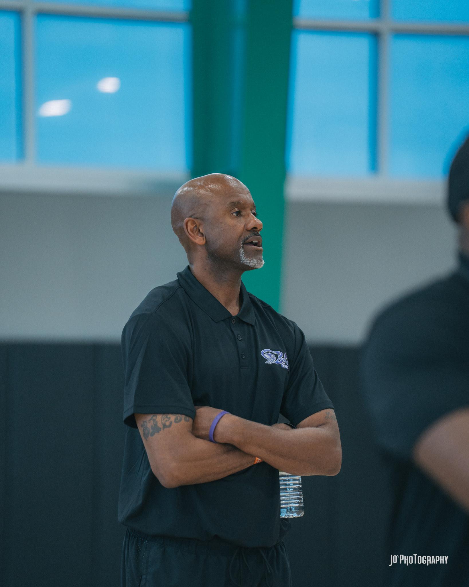 Coach giving instructions during practice